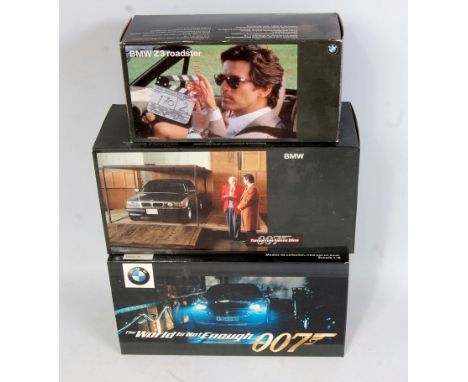 A Minichamps (UT Models) 1/18 and 1/24 scale James Bond 007 diecast group to include a BMW Z3 Roadster, a Tomorrow Never Dies