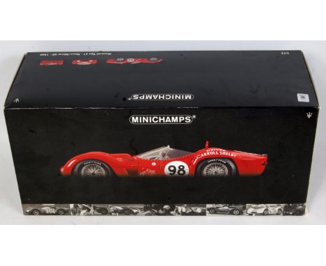 A Minichamps 1/12 scale model No. 120 601298 model of a Maserati Tipo 61, limited edition of 2000 pieces, finished in red wit