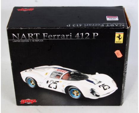 A GMP Model No. G1804114 1/18 scale replica model of a Nart Ferrari 412P finished in white with blue bonnet stripe, and racin