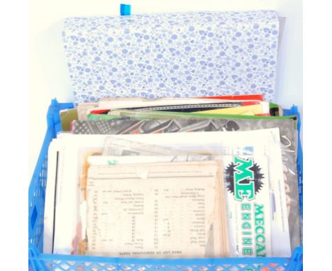 A tray containing a quantity of original and reproduction Meccano, Primus Engineering, and model collecting booklets and leaf