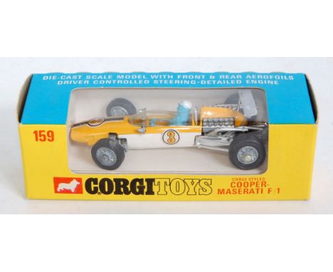 A Corgi Toys No. 159 Cooper Maserati F1 racing car comprising yellow and white body with racing No. 3 housed in the original 