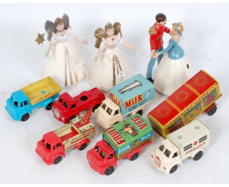 A collection of Brimtoy and Triang tinplate and clockwork vehicles and TV related models, to include two Triang Minic Fairy G