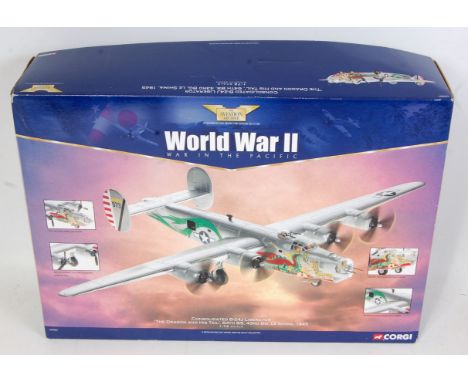A Corgi Aviation Archive No. AA34001 consolidated B24 Liberator, the Dragon and his tail diecast aircraft, 1/72 scale, appear