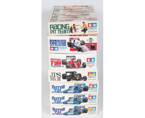 Seven various boxed as issued mixed scale Tamiya F1 racing car and racing pit team kit group, to include a Team Lotus JPS Mk 