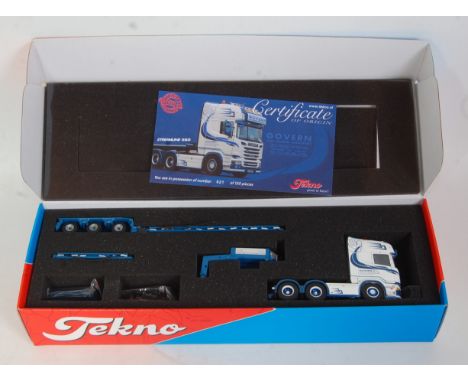 A Tekno 1/50 scale Govern Low Loader Transport model of a Scania Streamline 560 tractor unit with low loader trailer, limited