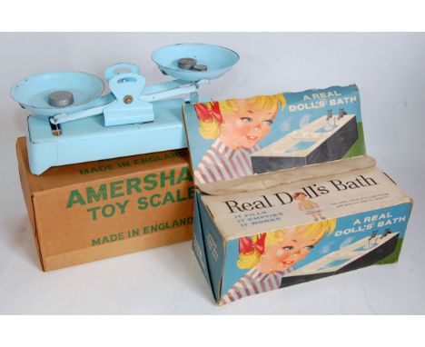 A collection of various boxed tinplate and plastic childrens toys to include a Triang mechanical washer, a HR Productions Rea