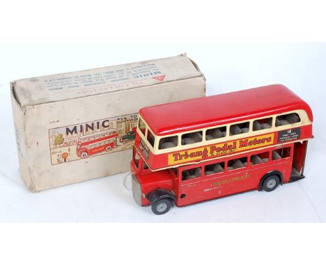 A Triang Minic tinplate and clockwork model of a double decker bus comprising red and cream body with London Transport livery