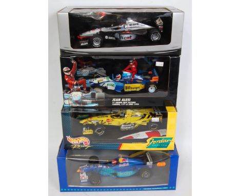 A Minichamps, Hotwheels, and Onyx 1/18 scale F1 racing car diecast group to include a Minichamps 18 Jean Alesi, Canadian 1995