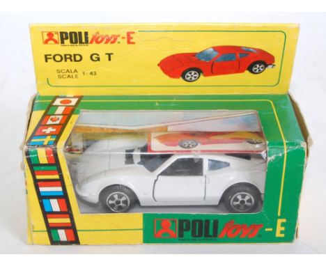 A Politoys boxed 1/43 scale model of a Ford GT finished in white, housed in the original window style box