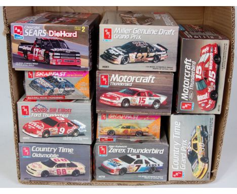 Ten various boxed AMT/ERTL 1/25 scale Nascar and Grand Prix Racing kit group, to include a Motorcraft Thunderbird, a Country 
