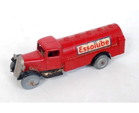 A French Dinky Toys No. 25B Esso Lube petrol tanker comprising red body with black chassis and base metal Mazak wheels, with 