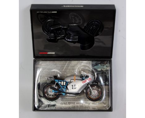 A Minichamps Classic Bike Series No. 29 Model No. 720016 1/12 scale model of a Ducati 750 Paul Smart Imola 1972 Motorcycle, a