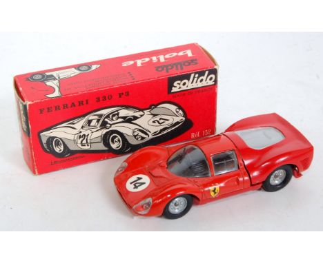 A Solido No. 152 Ferrari 330 P3 racing car comprising red body, black interior with cast hubs and racing No. 14 housed in the