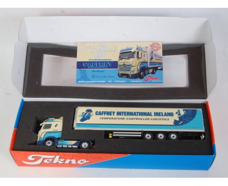 A Tekno 1/50 scale Model of a Caffrey International Mercedes Actros tractor unit and refrigerator trailer, limited edition ex