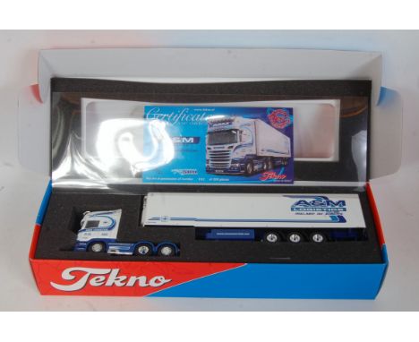 A Tekno 1/50 scale box model of an A&amp;M Logistics Scania R580 Streamline V8 tractor unit with refrigerated trailer, housed