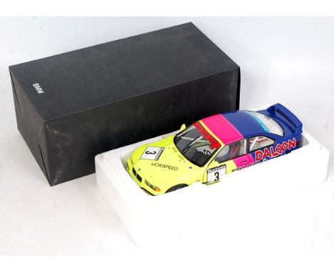 A UT Models BMW Promotional Issue, 1/18 scale GT cup 1993 Adac diecast group to include a Kris Nissen and a Johnny Cecotto M3
