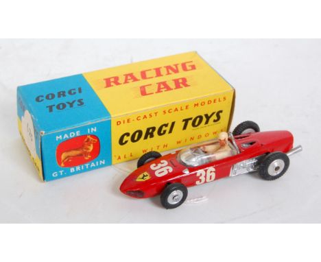 A Corgi Toy No. 154 Ferrari F1 racing car comprising red body with racing No. 36 and spun hubs, housed in the original racing