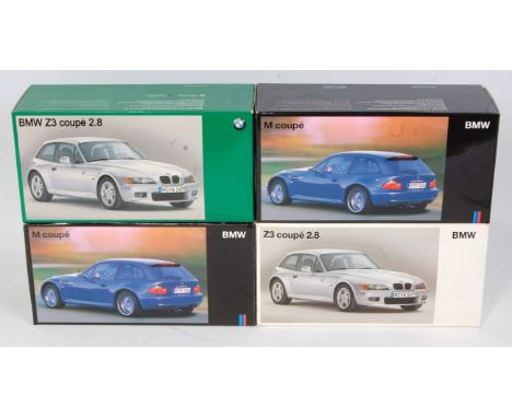 Four various UT Models 1/18 scale BMW diecasts all appear as issued in original BMW promotional packaging to include 2x BMW M