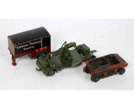 Three various loose Dinky Toys diecasts to include a No. 33RD LMS railway trailer, No. 161B anti-aircraft gun on trailer, and