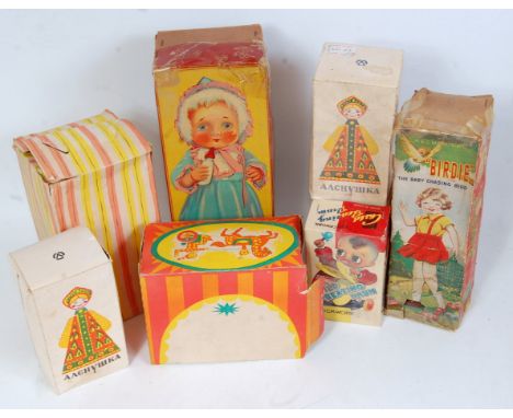 Eight various boxed Japanese and Russian tinplate and clockwork toys to include a Chinese No. MS765 clockwork child beating a