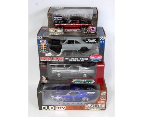 A collection of various 1/18 and 1/24 scale American Supercar and Big Time Muscle race cars to include a Super Car Collectabl