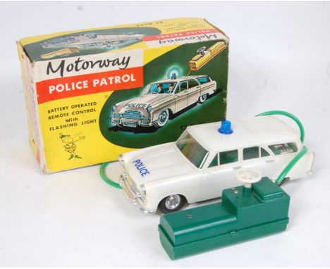 A Marx Toys of Hong Kong plastic and battery operated model of a Motorway Police Patrol Car Ref. No. R6454 finished in white 