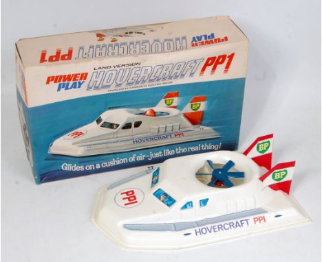A Power Play boxed plastic and motorised model of a land version Hovercraft PP1, powered via a powerful electric motor, appea