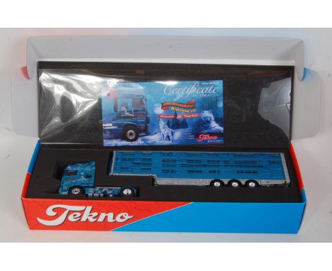 A Tekno 1/50 scale model of a Mcauliffe Daf XF livestock tractor unit and trailer, model No. 67950, appears as issued with ce