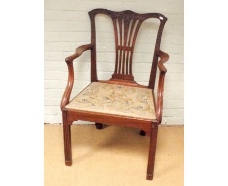 A Chippendale style mahogany elbow chair with tapestry upholstered seat 