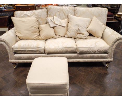 An excellent 3 seater settee in cream patterned material with loose cushions and matching pouffe 