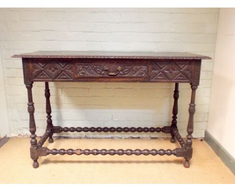 Victorian dark oak hall table fitted one drawer with pie crust edge standing on bobbin turned legs, 4' wide 