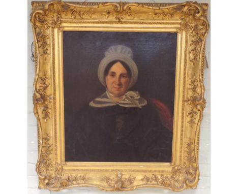 A large Victorian oil portrait of an old lady in good decorative swept gilt frame 29 1/2"x 24 1/2" 