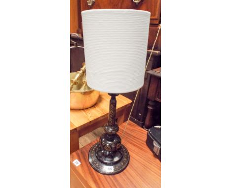A black and gilt lacquered table lamp with shade  