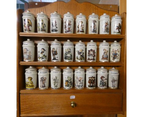 Hummel spice rack with wall hanging rack and various spice containers 