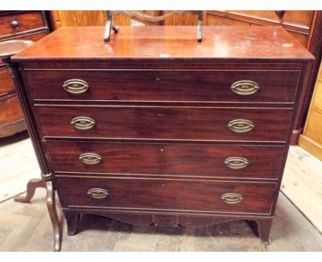 Late Georgian mahogany chest of four long drawers with brass handles standing on splayed bracket feet, 47" wide 