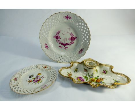 Three pieces of Dresden Meissen porcelain to include ribbon plate with puce and gilt decoration, small ribbon plate and an in