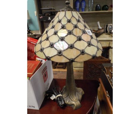 A Tiffany style table lamp with shade
