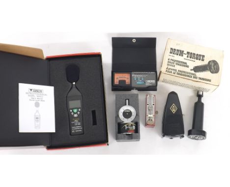 Selection of electronic and other items including a Tama tension watch, a Drum-Torque, Boss TU12, sound level meter,Talktell 