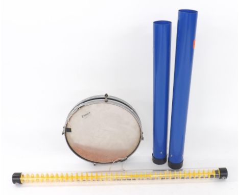 Latin Percussion clear Perspex rain stick; together with two Afro Percussion rattle tubes and an old Premier drum converted t