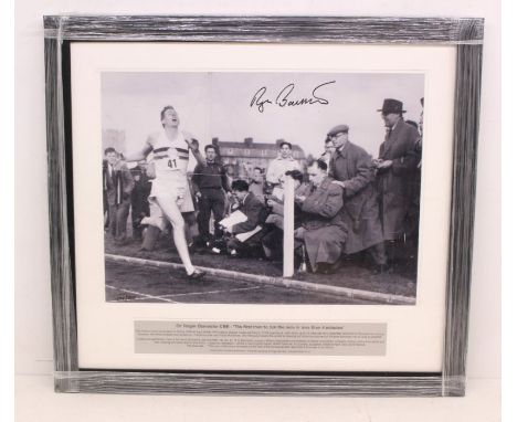 Athletics Interest: A framed and glazed, black and white action photograph of 'Sir Roger Bannister CBE - The first man to run