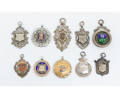 Football: A collection of ten assorted, silver hallmarked medal fobs, some enameled to comprise: 'Holbrook &amp; District Foo