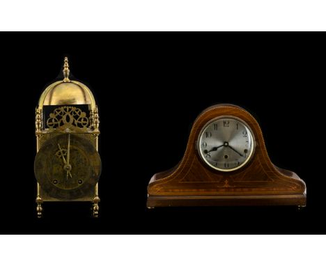 An Edwardian Inlaid Mahogany Mantle Clock silvered dial with Arabic numerals, Napoleon hat shape form, raised on a plinth. Ba