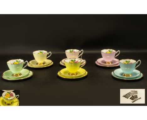 A Set of 6 Longton Cavourware China Trios comprising of 6 pastel shade sets with floral decoration to interior of each cup. C