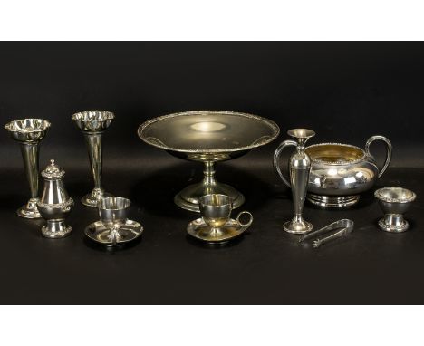 Small Collection of Silver Plate, to include fruit bowl on raised centre leg; two small bud vases with fluted rims; a round t