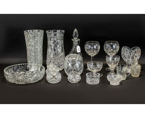 Collection of Crystal Glassware to include an elegant decanter with stopper, 12" tall; two tall crystal glass vases, both 11"