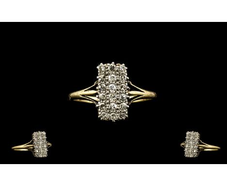 Ladies Attractive 18ct Gold Diamond Set Dress Ring of rectangular form set with 18 small round cut diamonds of good colour an