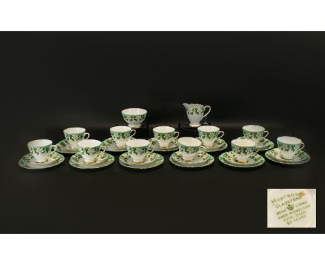 Montrose 'Gladstone' Bone China Tea Service in white ground with pale green border with winter rose design in white.  Compris