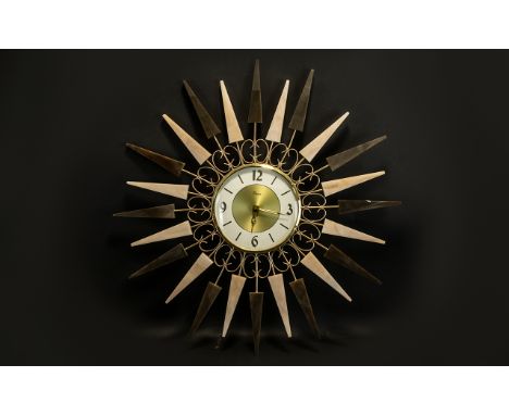 A Paico Starburst Wall Clock in a statement sculptural eye-catching design c1960's 20 inches in diameter.