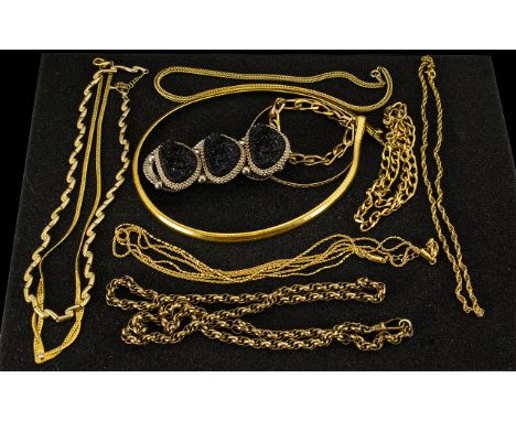 An Assortment of Gold Plated Jewellery to include a snake necklace, a belcher chain, various fine necklaces, a bangle and a c