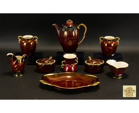 A Collection Of Carlton Ware Rouge Royale Ceramics Nine pieces in total to include two leaf form preserves pots, two twin han